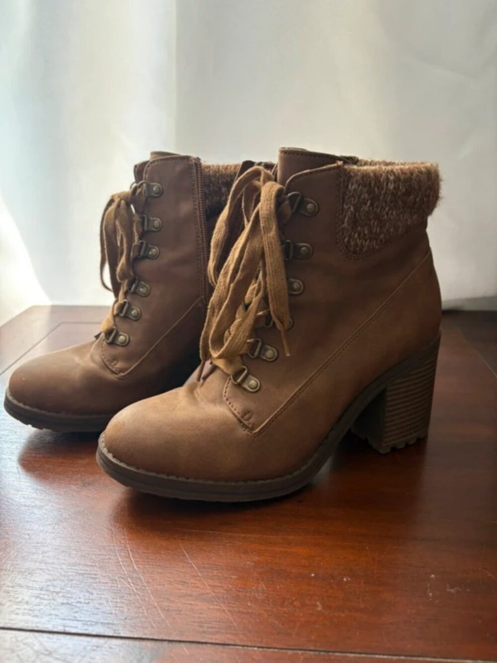 Place up heeled boots